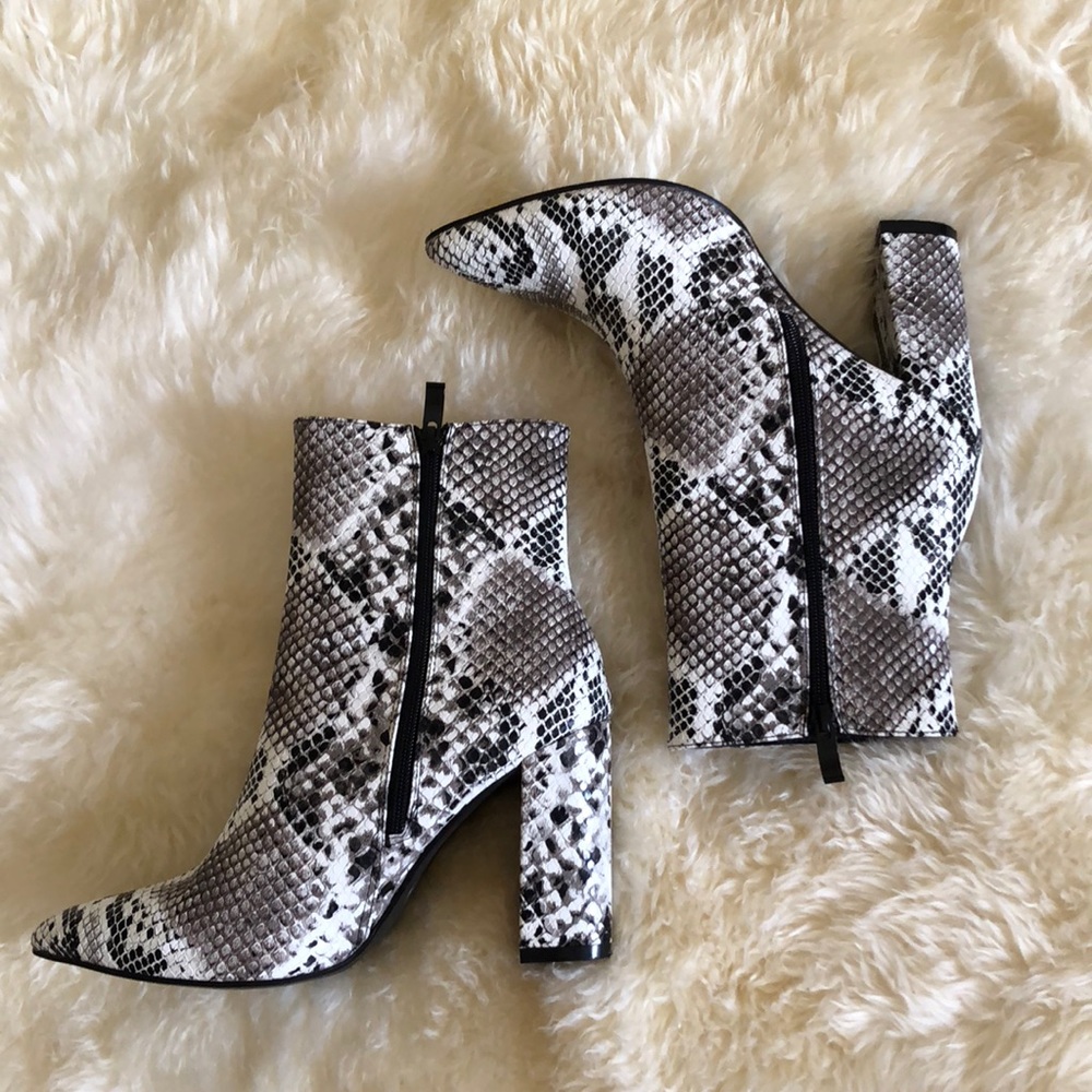 Snakeskin booties. New.